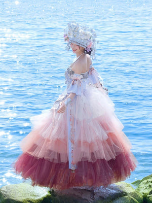 Back view of Pink Miao Clothing Women's Summer Cake Green Dress showing full layered skirt and detailed silver headpiece.