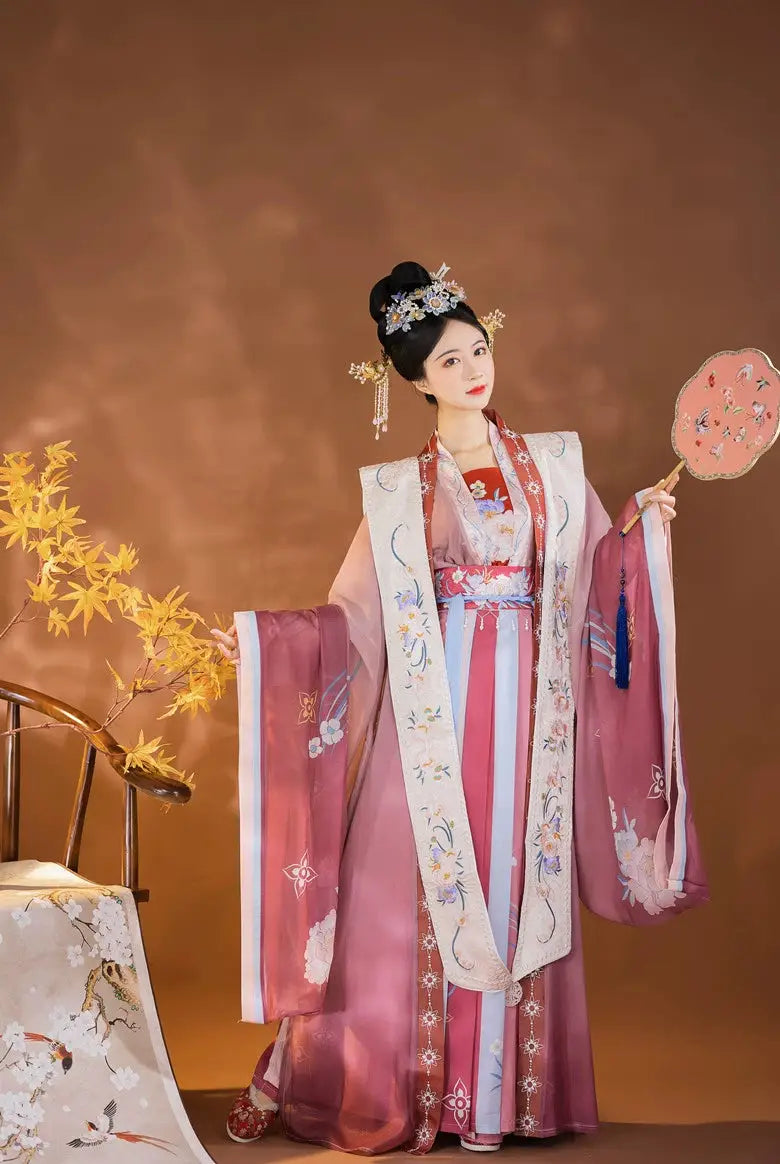 This pink hanfu with elegant hanfu sleeves is inspired by Ming Dynasty hanfu male designs. Perfect as a princess hanfu dress, it’s available in silk hanfu, cotton hanfu, and hanfu lolita styles. Featuring layered hanfu jacket options, it’s ideal for hanfu women, including plus size hanfu. Pair it with a hanfu shirt and shop authentic designs at our hanfu shop.