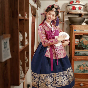 Elegant Korea Yanji Princess Court Hanbok with intricate gold patterns.