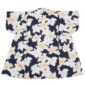 Flat lay of a black and white floral Japanese kimono dress, showcasing its elegant design and traditional aesthetic.