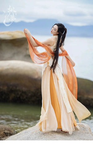 Elegant cheongsam dress with sheer shawl by the sea