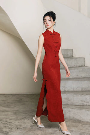 Vermilion red sleeveless cheongsam in walking pose by staircase