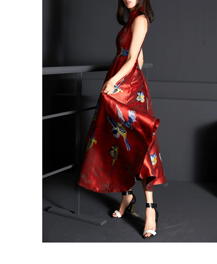 Side profile of red satin cheongsam dress with intricate jacquard patterns.