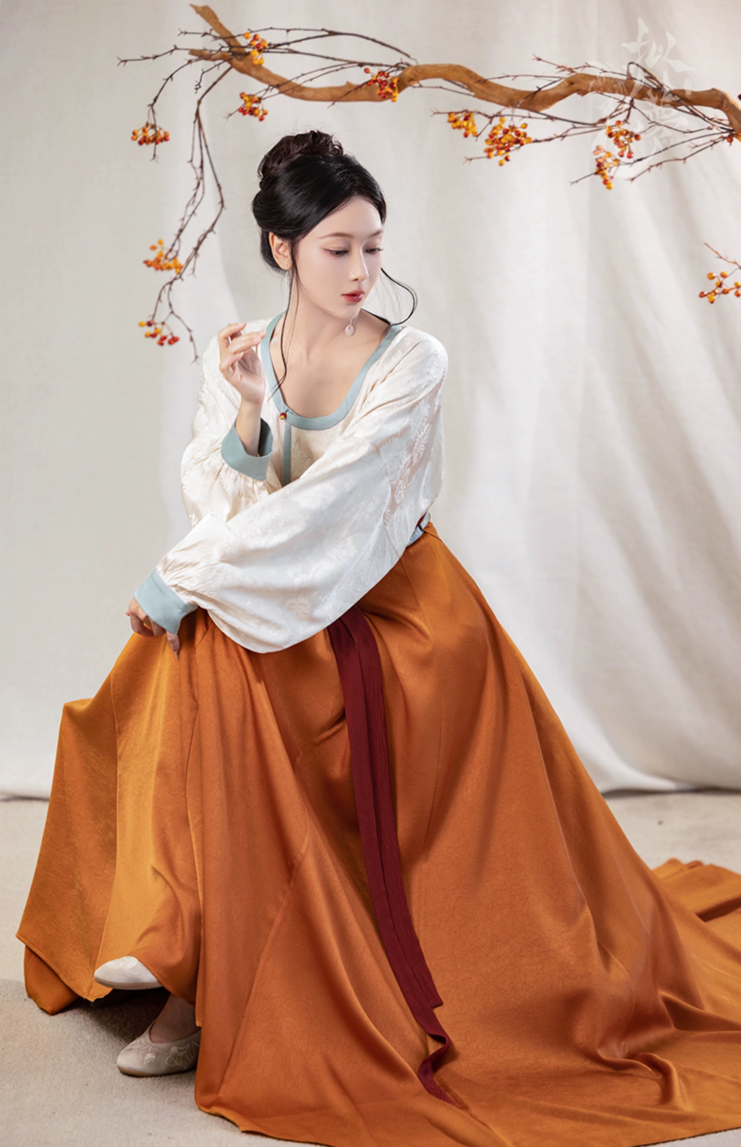 This orange modern hanfu features elegant hanfu sleeves, a stylish hanfu jacket, and timeless Ming Dynasty hanfu charm. Perfect as a princess hanfu dress, fairy hanfu dress, or casual hanfu, it’s great for hanfu cosplay or as a warm winter hanfu. Pair with a hanfu shirt or wear it as a modern hanfu dress. Shop authentic orange hanfu at our trusted hanfu shop, offering modernised hanfu and styles from the best Chinese designer clothing websites and modern Chinese clothes collections.