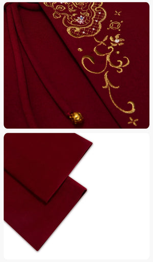 Red coat buttons, embroidery and cuff details