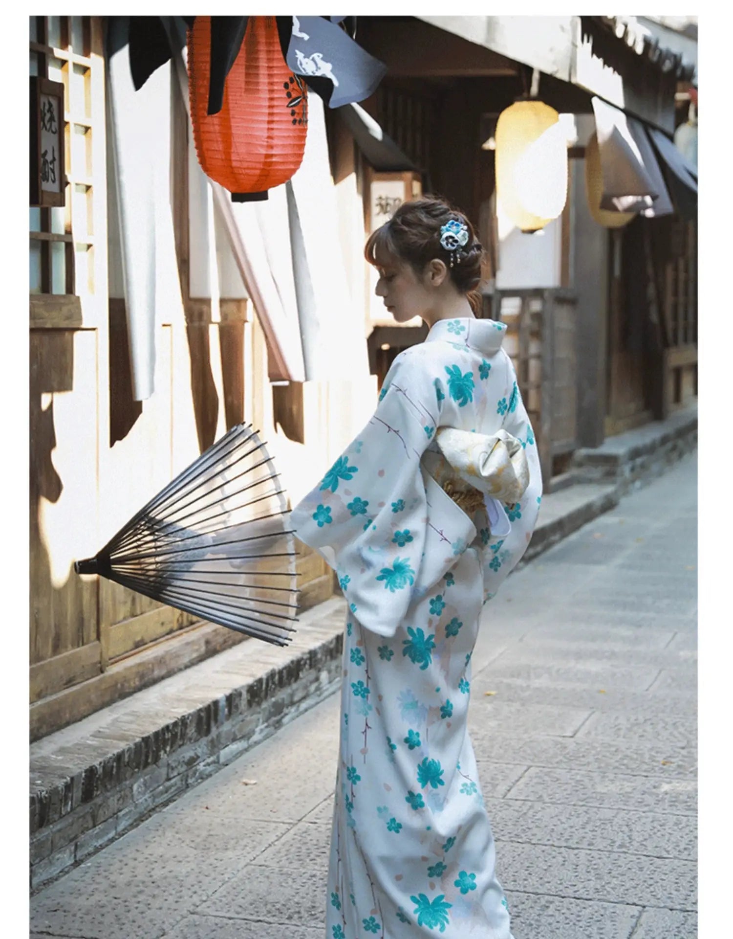 Elegant white and blue floral Japanese Yukata Kimono Dress styled with a traditional parasol, perfect for photography and cultural events.