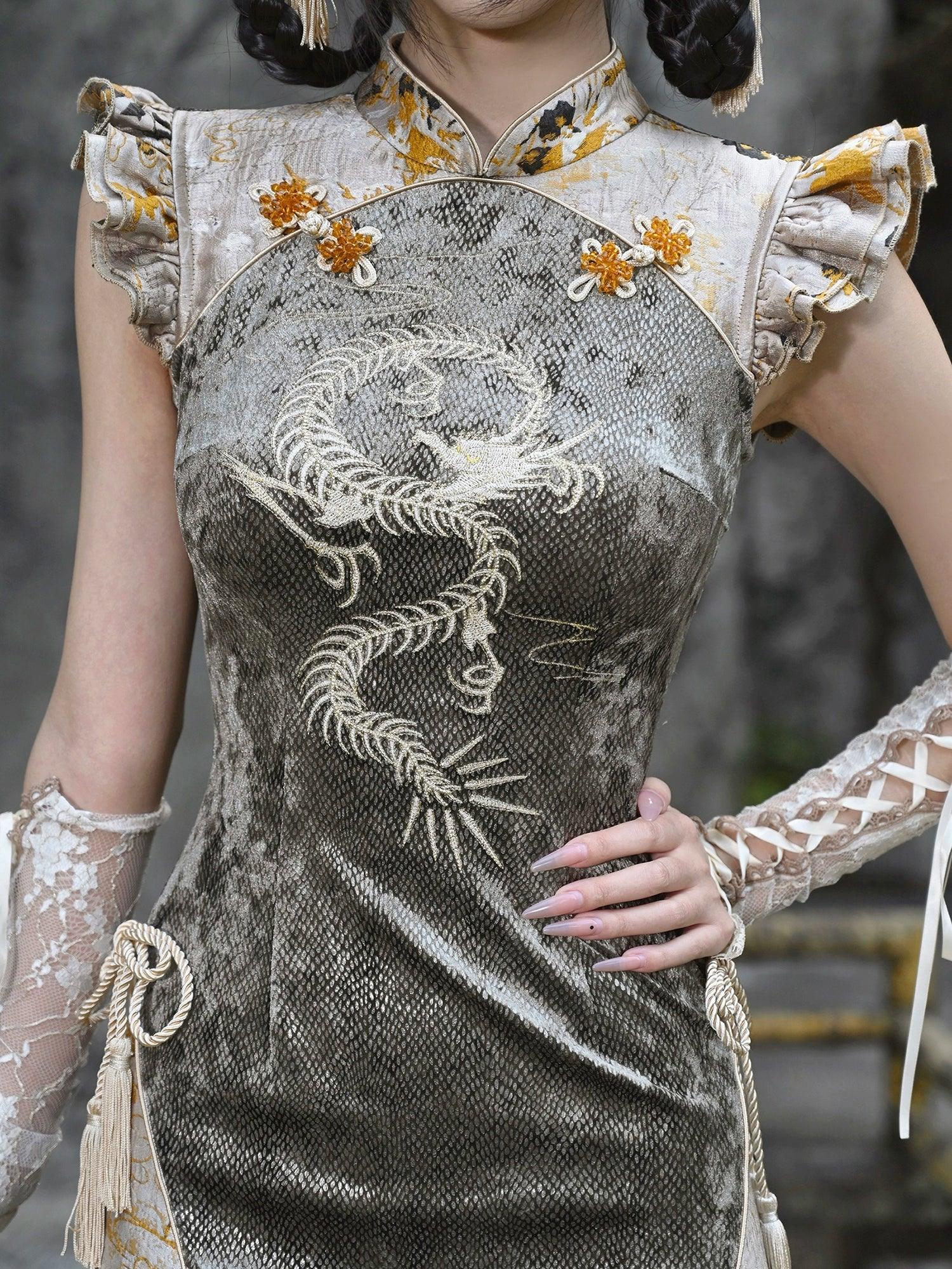 silver dragon dress Sculpted in icy blue and silver, this dragon gown comes alive by Leo Almodal with hand-embroidered scales, crystal flames, and a majestic dragon crest guarding the heart
