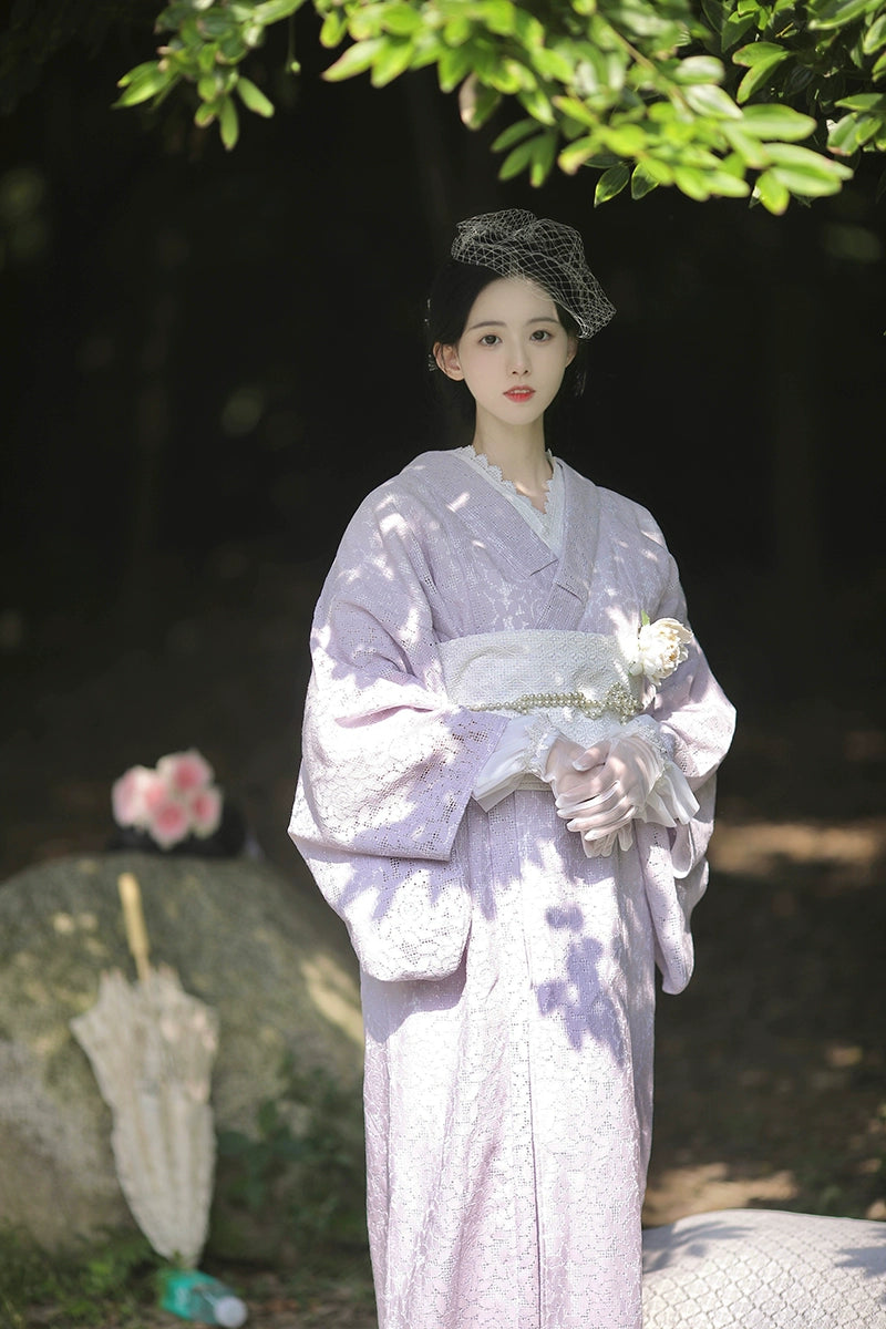 Full view of a purple lace Taisho Romance kimono in a forest setting.