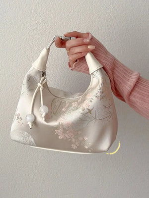 Complete your look with this elegant white cheongsam Bag, designed to complement both modern hanfu and traditional hanfu styles. Perfect for hanfu women, this bag adds charm to casual hanfu, hanfu cosplay, or layered hanfu outfits. A must-have hanfu accessory, it’s ideal for carrying essentials while maintaining an authentic style. Wondering where to buy qipao or accessories? Shop now at our trusted hanfu shop for the best modernised hanfu bags.