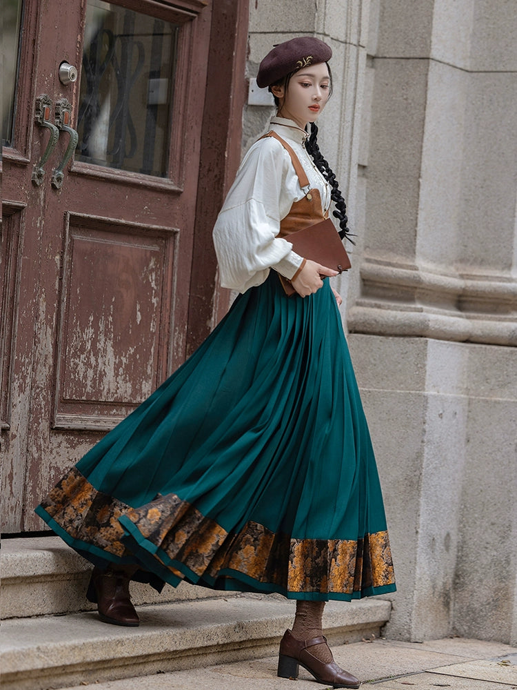 Elegant Afternoon Overture Hanfu featuring a teal pleated skirt with golden floral hem, paired with a white embroidered blouse and brown vest.