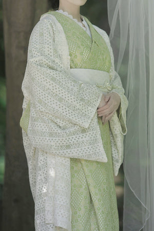 Close-up of lace details on green Taisho Roman kimono dress.