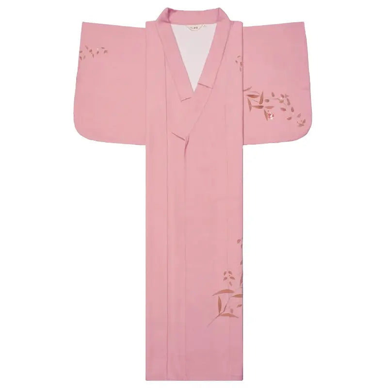 Flat-lay of a pink Japanese kimono yukata with floral patterns, highlighting its elegant design and traditional craftsmanship.