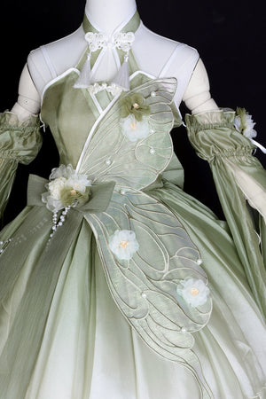 Detailed embroidery on Flower Marriage Green Lolita Dress featuring butterfly wing and floral accents for a whimsical look.