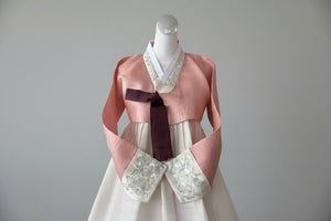 Traditional Korean hanbok on a mannequin with a blurred background