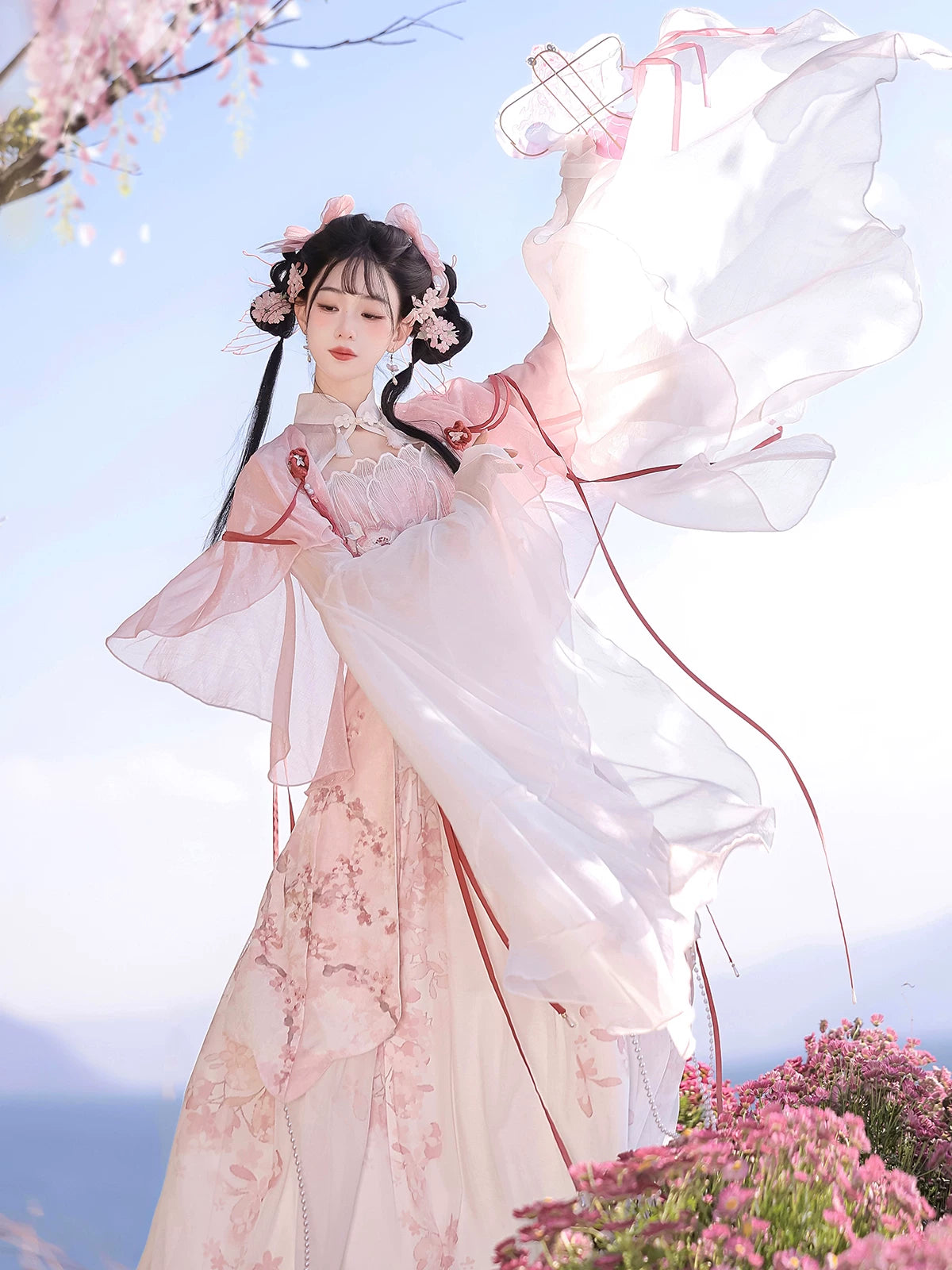 Pink white sheer lolita hanfu wide sleeve outer robe and lace up mini skirt with tassel belt sakura fairy style set for women back view