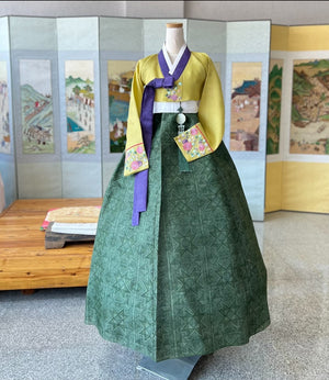 Korean traditional hanbok bold yellow green silhouette with hand embroidered floral details