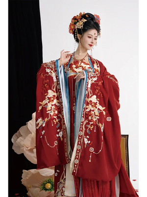 Traditional authentic tang style bridal hanfu custom embroidered red gown with grand flowing sleeves for bride standing front