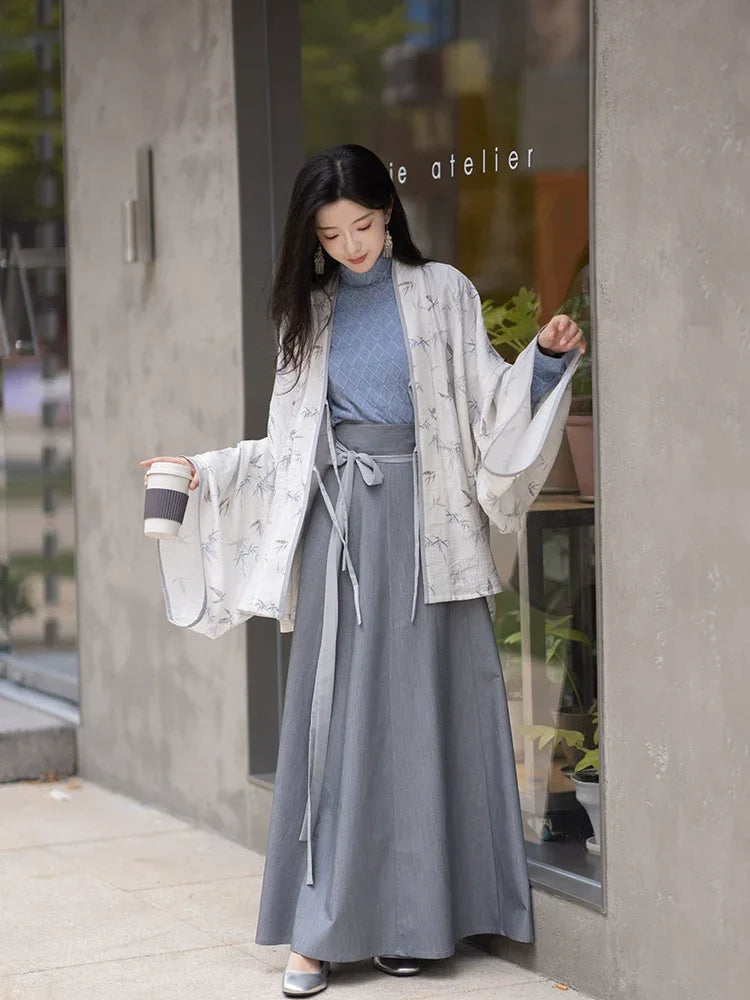 White dew bamboo shadows and swallow whispers jin style hanfu set tencel pleated robe with rayon camisole and flowing skirt for women front view