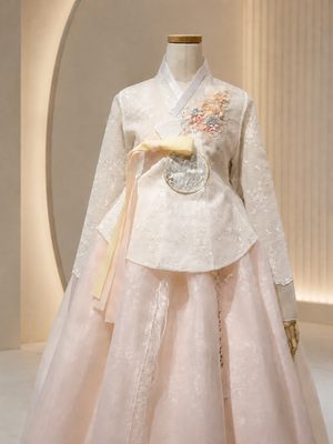 Complete women hanbok set white long sleeve jeogori blush pink full chima skirt with yellow bow elegant bridal style full length view

