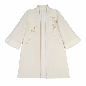Apricot open-front Hanfu coat displayed alone with floral details, wide sleeves and slanted pockets
