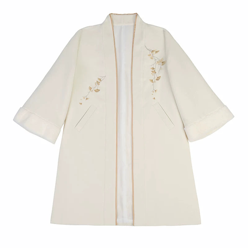 Apricot open-front Hanfu coat displayed alone with floral details, wide sleeves and slanted pockets