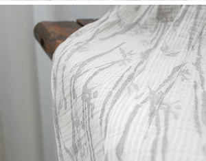 Flowing hem and layered cotton texture of the long bamboo leaf robe