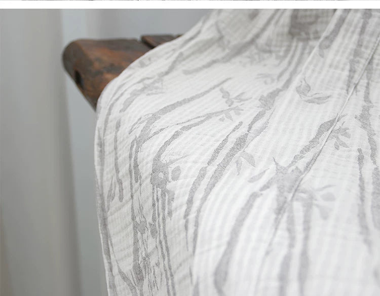 Flowing hem and layered cotton texture of the long bamboo leaf robe