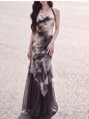 Black and white halter dress with asymmetric layered hem