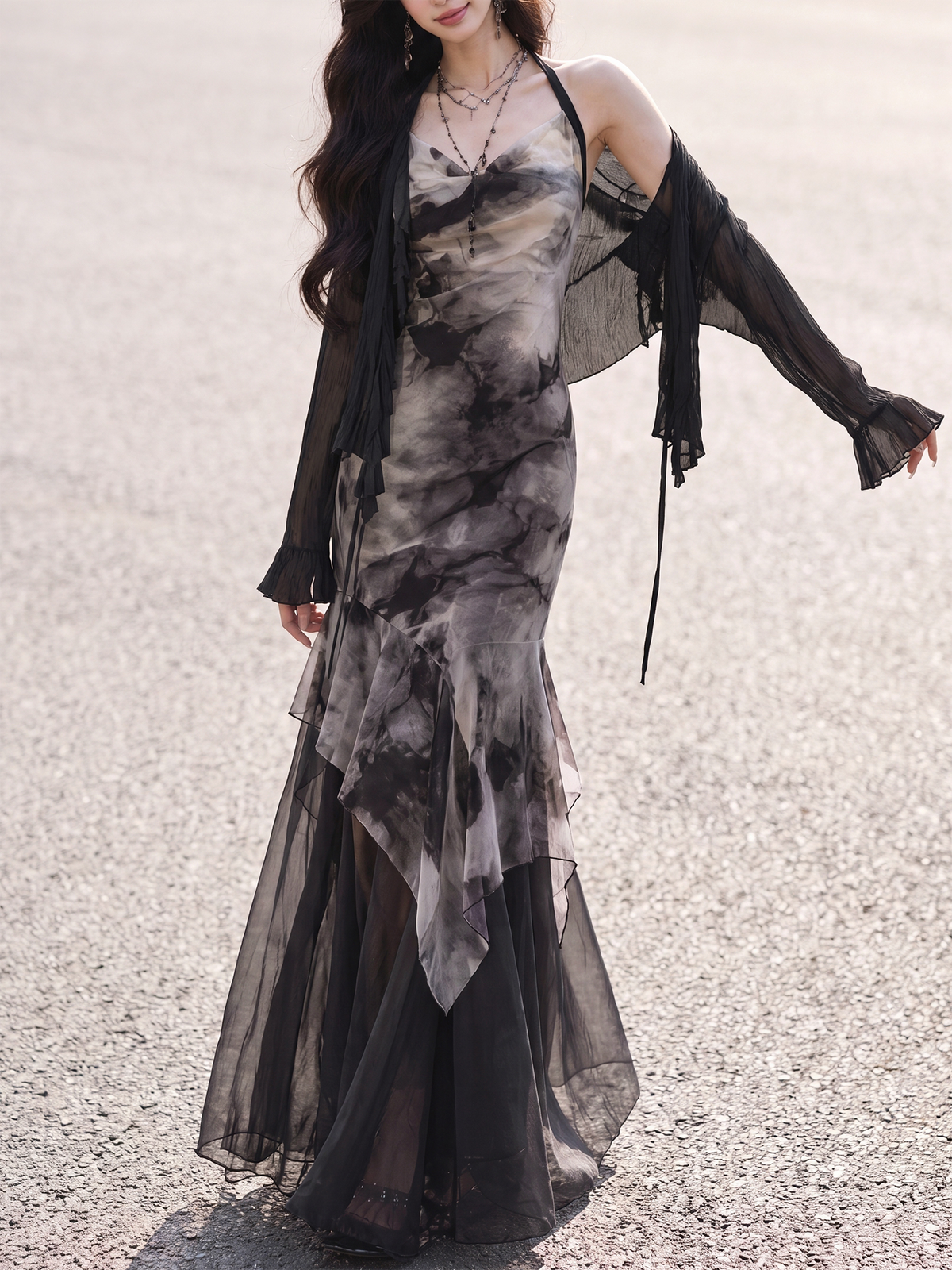 Black and white ink print halter dress with black chiffon cardigan front view