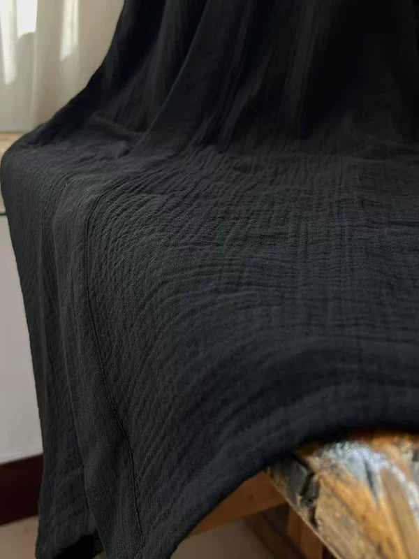 Full-length black cotton gauze robe showing the 120 or 135 cm silhouette