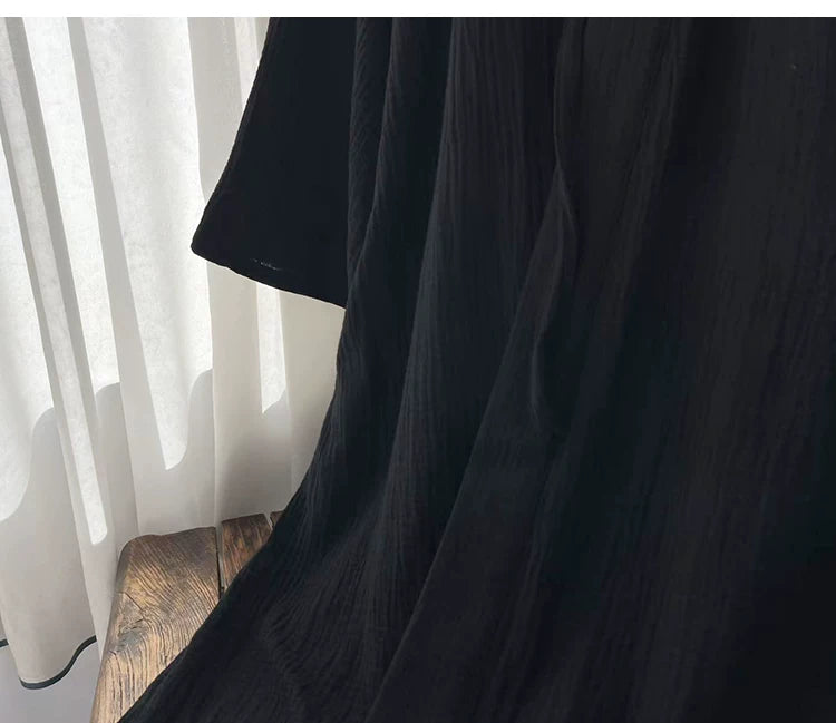 Wide sleeve and cuff construction of the breathable black robe