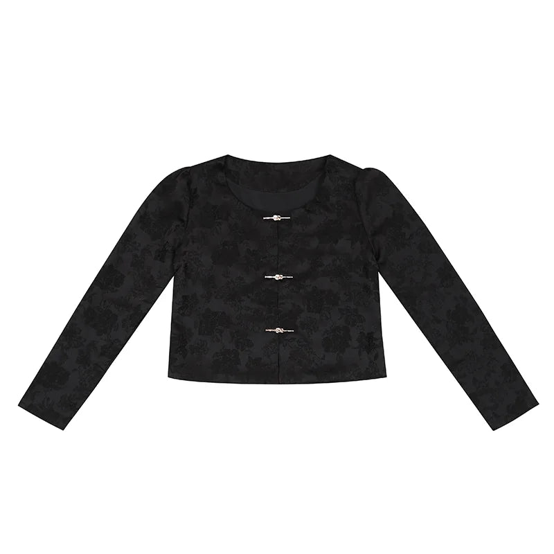 Black cropped jacquard jacket laid flat