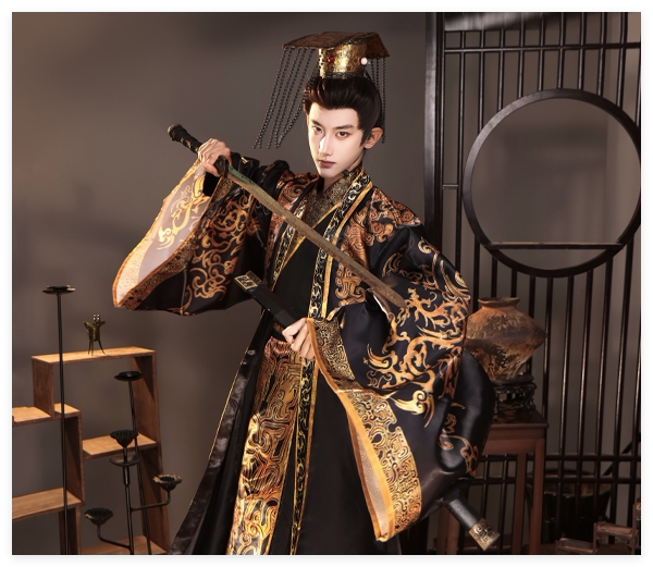 Black and gold emperor Hanfu costume with a gold-tone crown, shown holding a sword