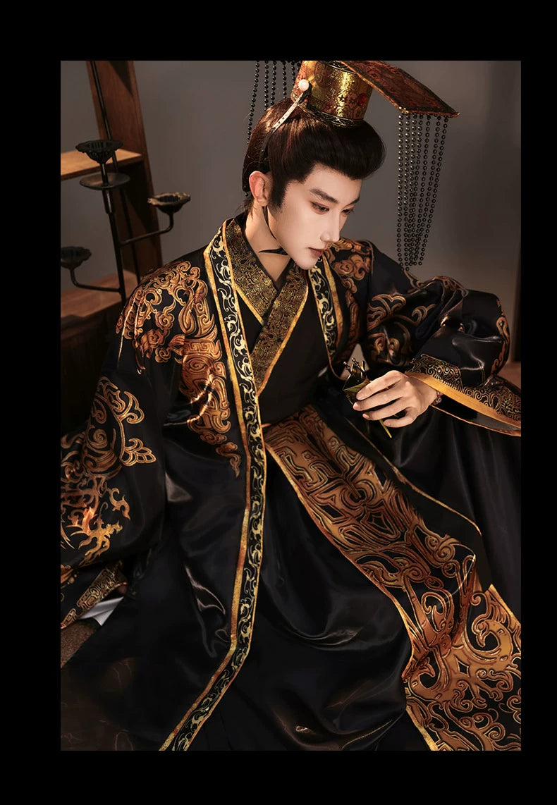 Black and gold emperor Hanfu costume showing the layered collar, waist sash and dragon motifs