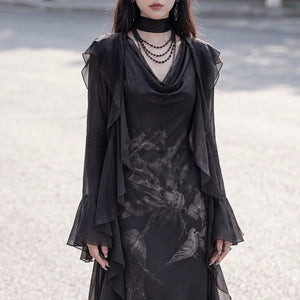 Black ruffle chiffon cardigan layered over floral dress