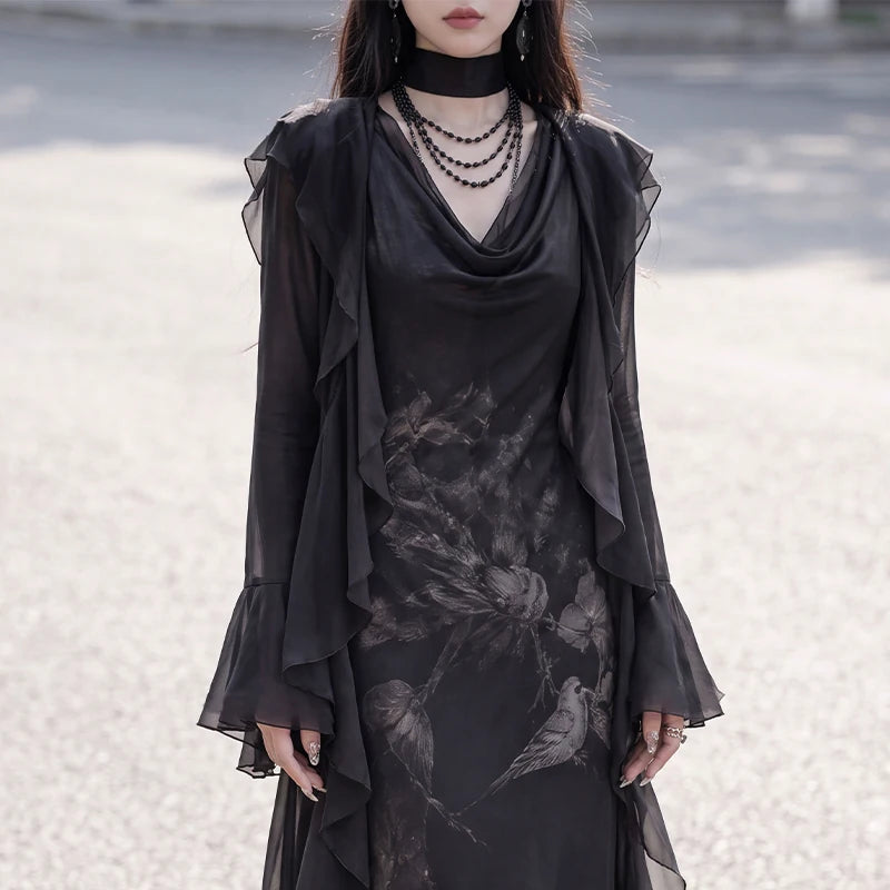 Black ruffle chiffon cardigan layered over floral dress