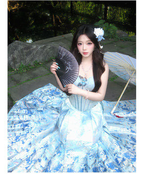 Blue brocade wrap skirt showing the pleated side
