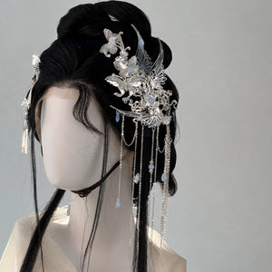 Blue-white butterfly hair clip with silver-tone bird and floral details