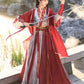 Red modern hanfu dress for women, blending traditional Song Dynasty elegance with contemporary style. Crafted from luxurious silk, this hanfu includes an optional matching coat or jacket, making it suitable for winter, casual outings, or formal occasions like graduations. Available at our online hanfu shop, offering a range of authentic hanfu for sale, this piece combines the beauty of classic Chinese clothing with modern fashion elements from top Chinese brands. Perfect for anyone looking for where to buy 