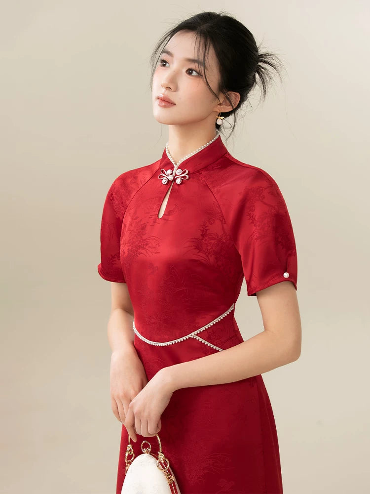 Design view of the Ceremonial Red jacquard engagement qipao dress, highlighting rich jacquard texture, fitted cheongsam shape and engagement-ready red color.