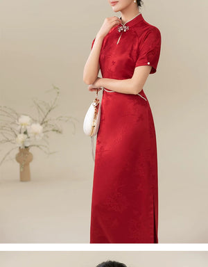 Detailed product image of the Ceremonial Red jacquard engagement qipao dress, showing fabric texture, finish and craftsmanship.