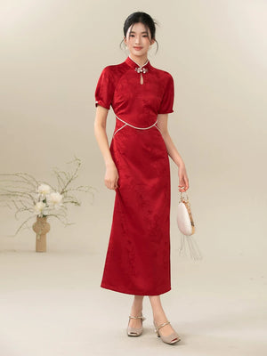 Front styling view of the Ceremonial Red jacquard engagement qipao dress, with rich jacquard texture, fitted cheongsam shape and engagement-ready red color.