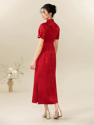 Ceremonial Red jacquard engagement qipao dress styled to show its fit and drape, including rich jacquard texture, fitted cheongsam shape and engagement-ready red color.