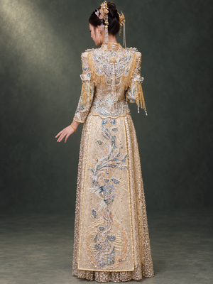 Champagne dragon and phoenix Xiuhe bridal outfit, back view and shoulder fringe