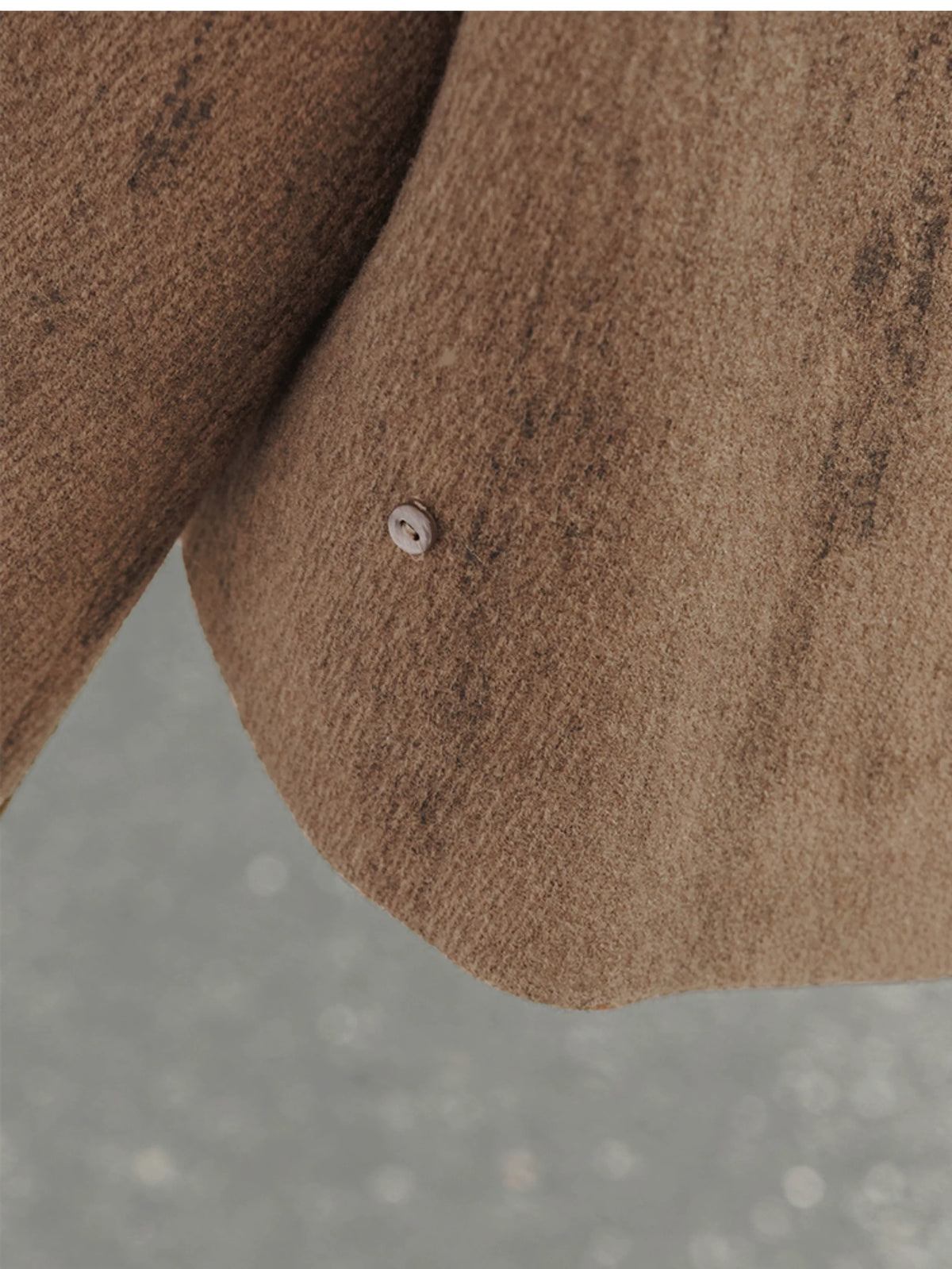 Coffee jacket detachable trim fastening detail