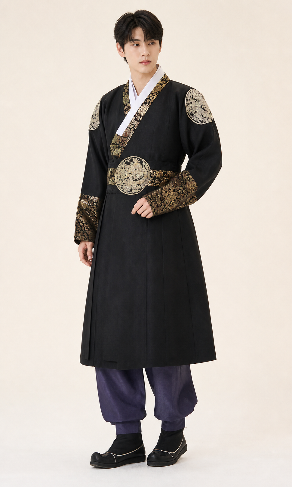 Men's dark Yanji Korean hanbok robe with black fabric, gold brocade collar, shoulder patches and circular waist panel