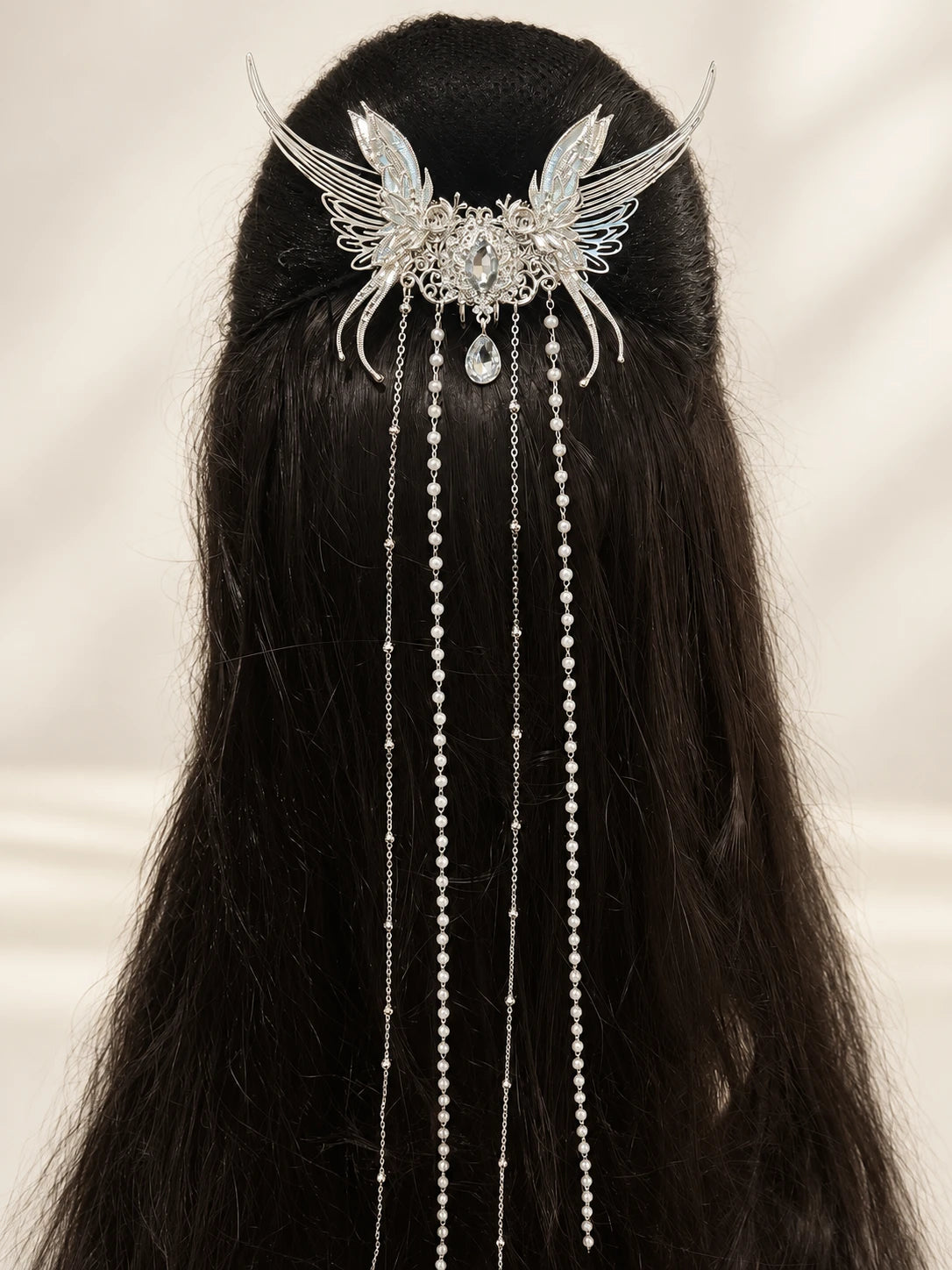 Butterfly back ornament with long chains
