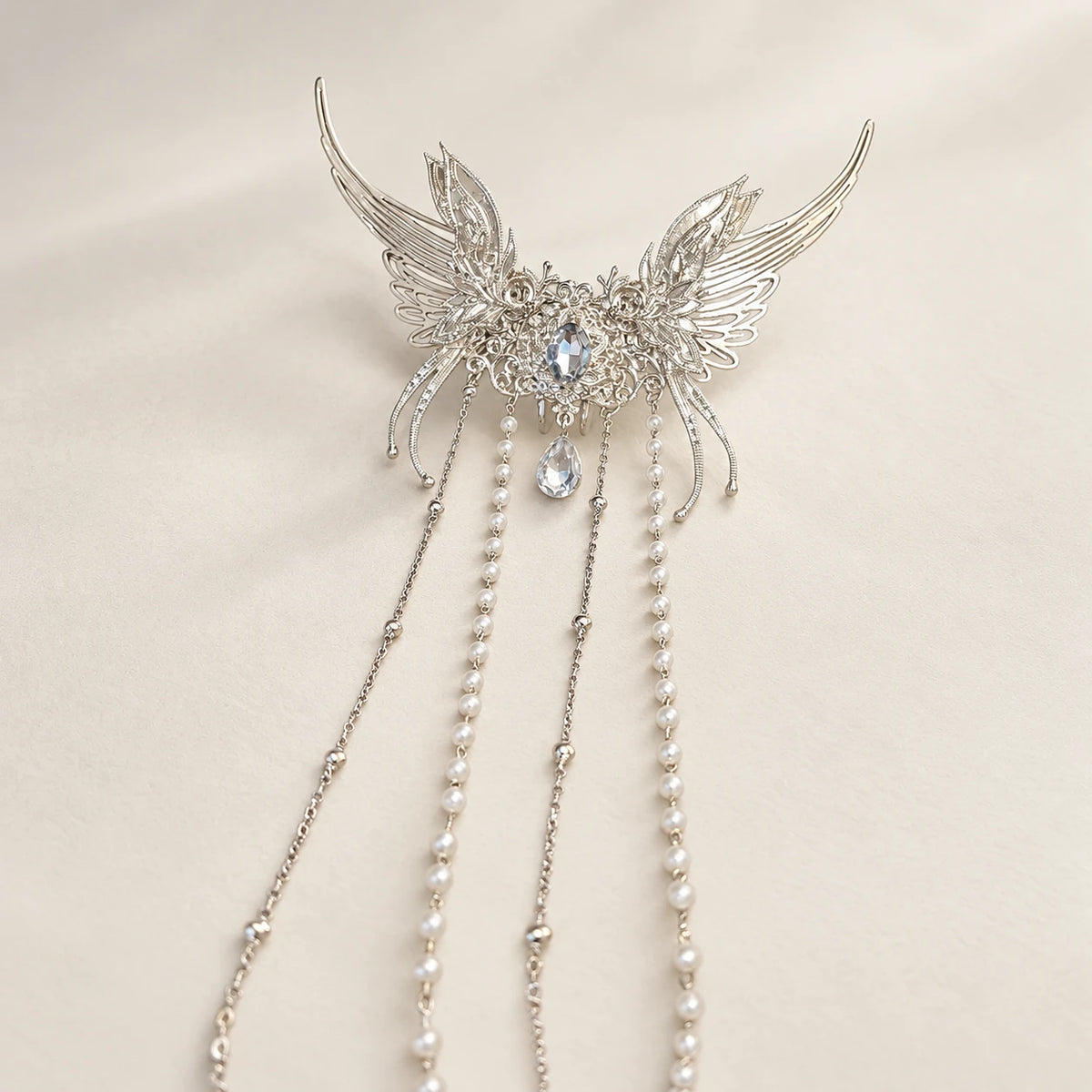 Close-up of butterfly ornament and hanging chains