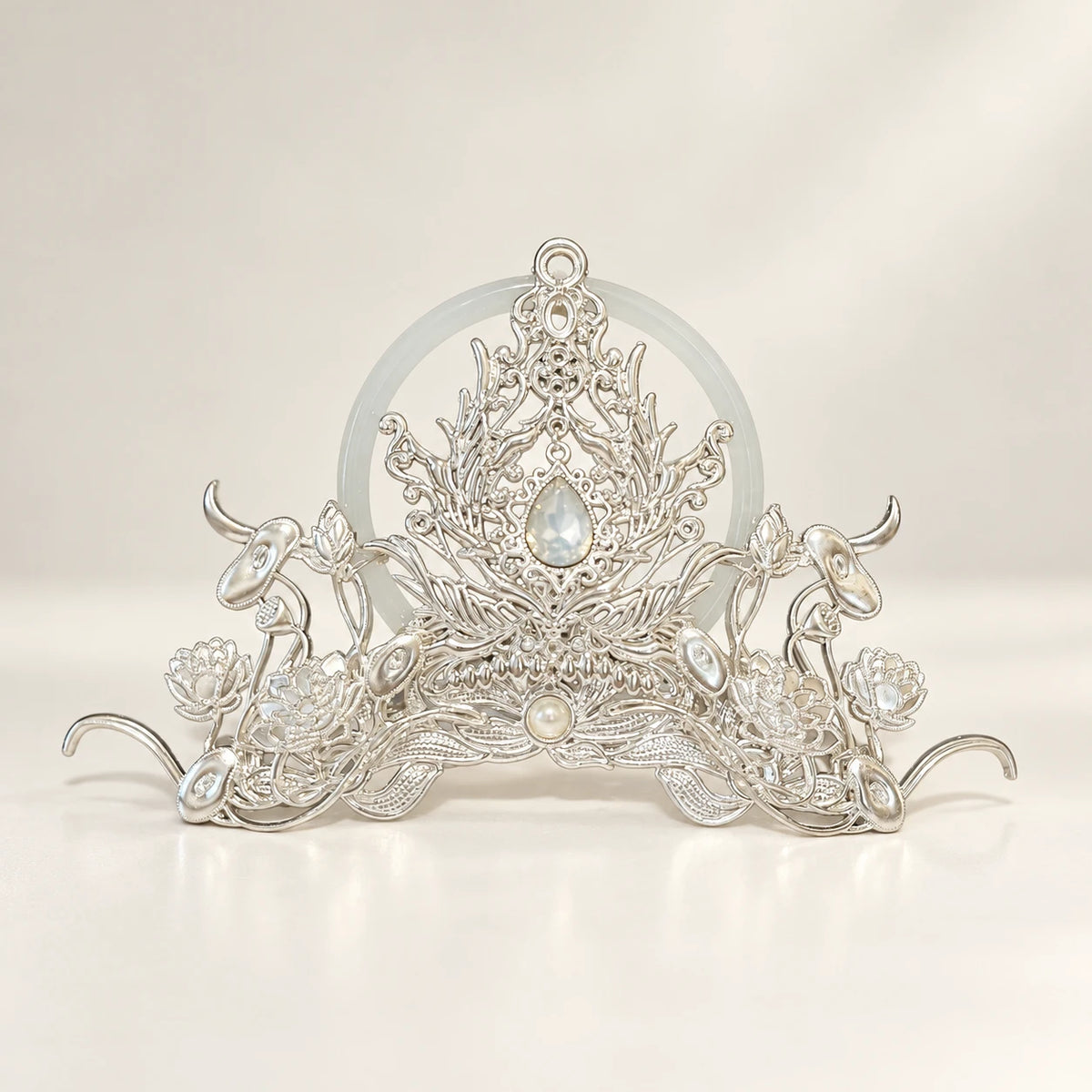 Silver-tone front crown with clear centre accent