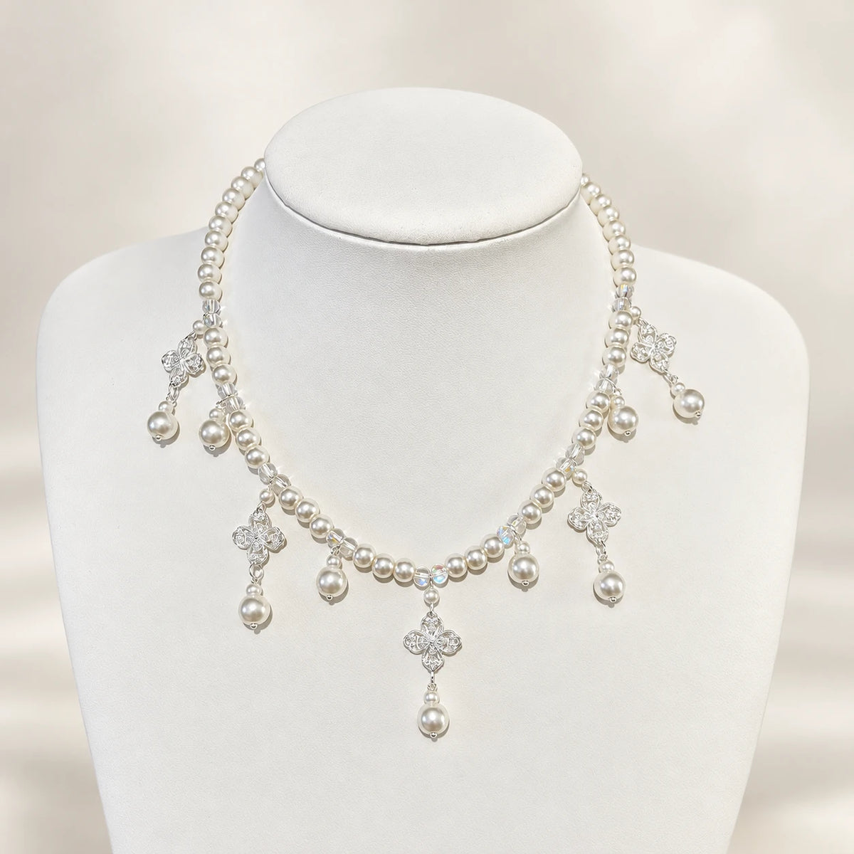 Silver-tone matching necklace with clear drops